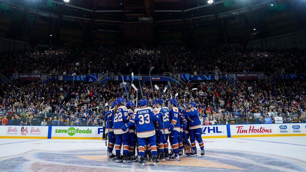 The Vancouver Goldeneyes celebrate their first win in team history.